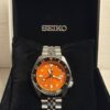 Seiko GMT Sports Watch – Automatic Dual Time Zone Timepiece (orange)